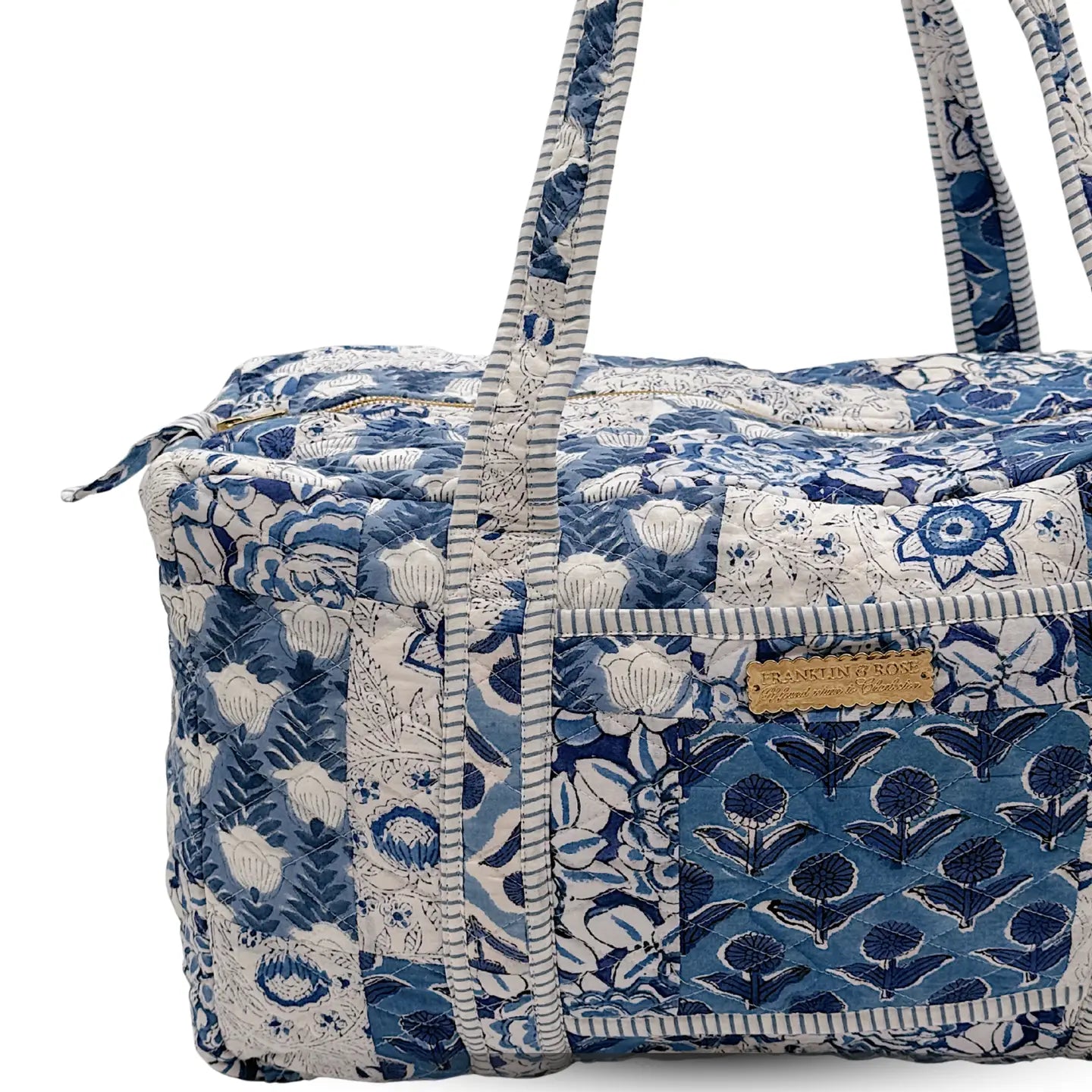 blue floral duffle bag