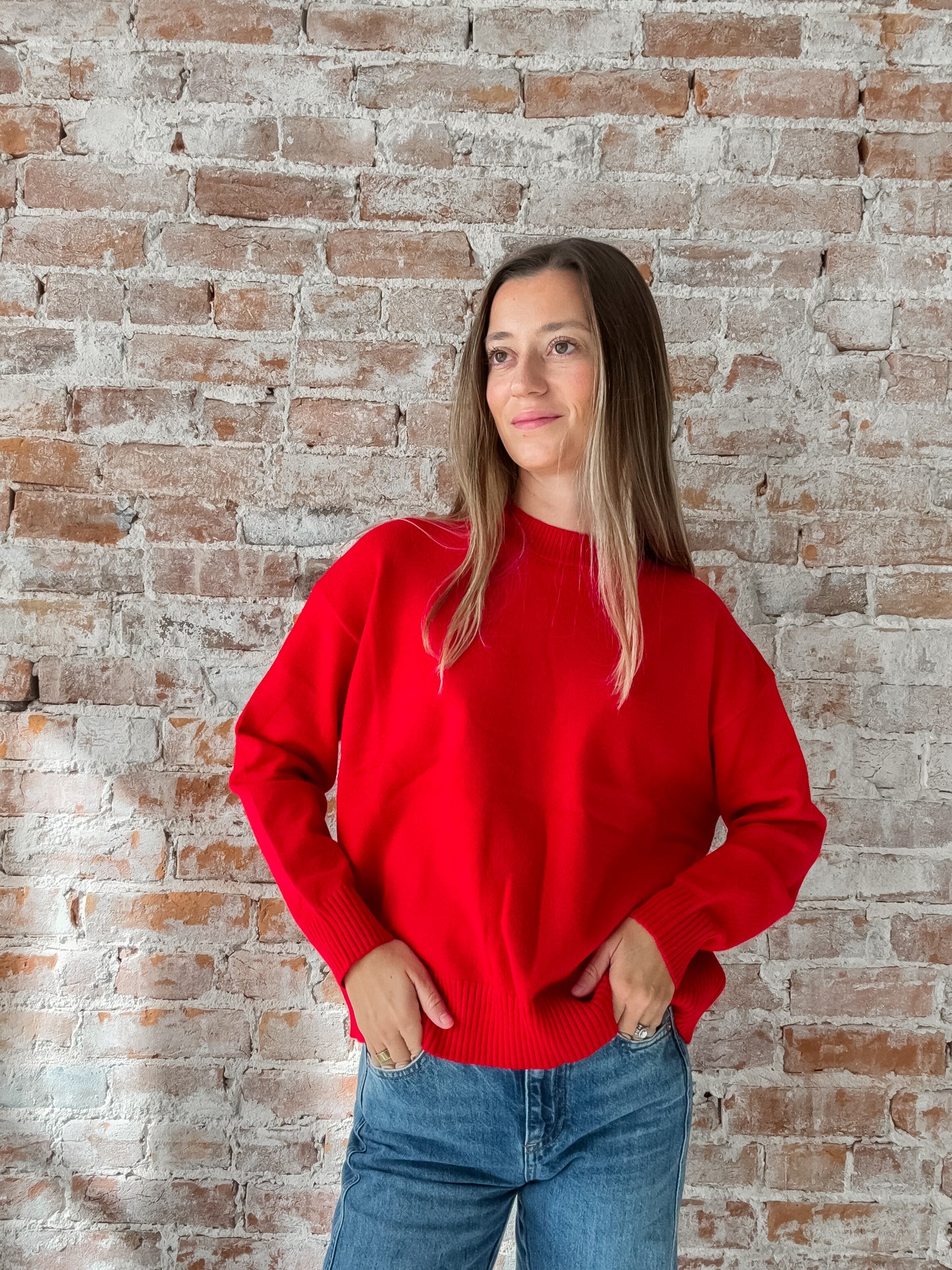 red crewneck sweater