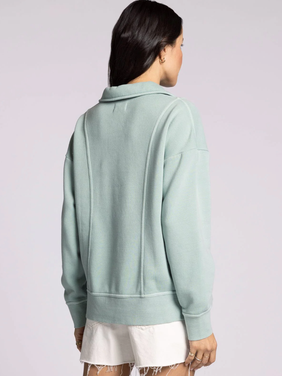 light blue collared sweatshirt