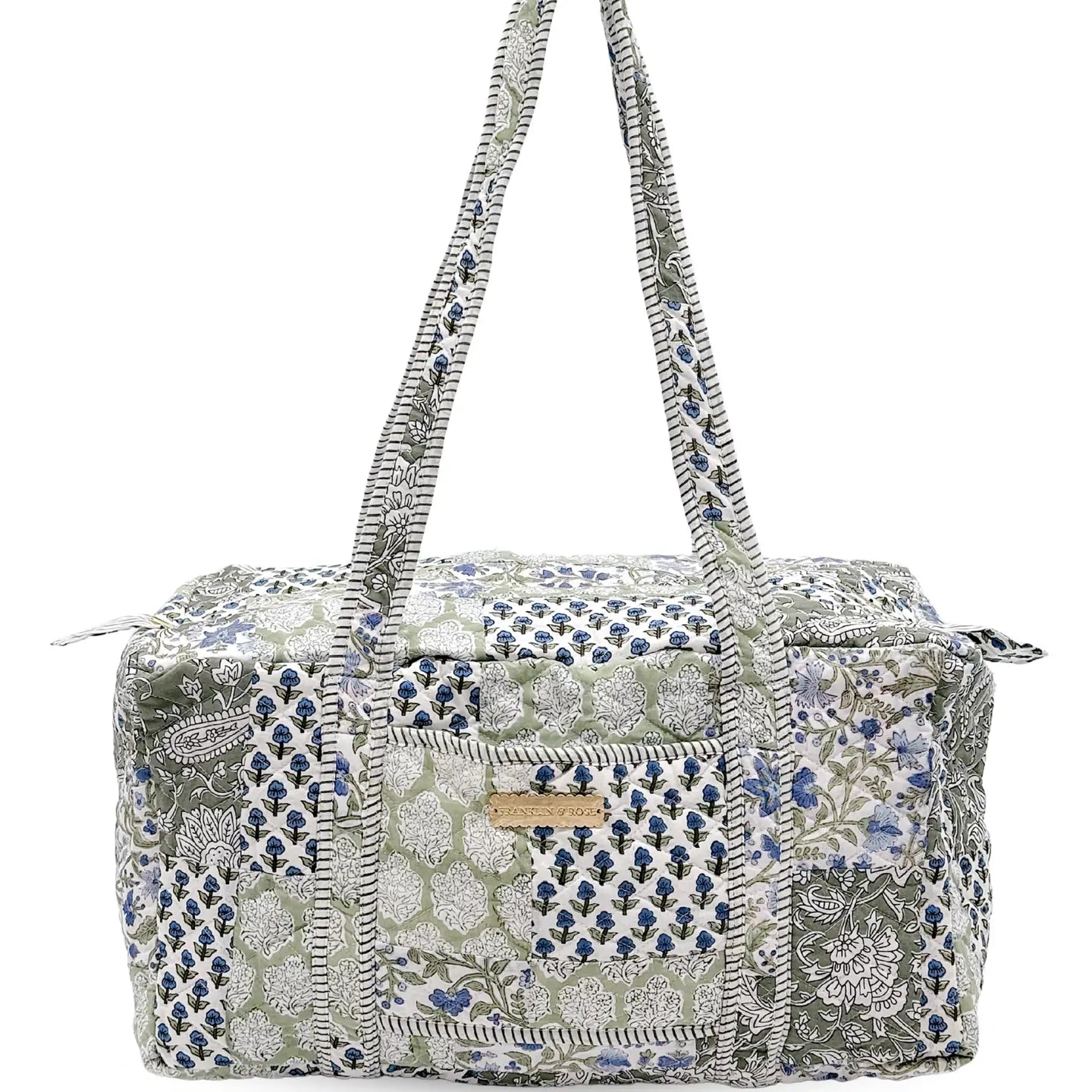 green and blue floral pattern duffle bag