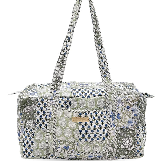 green and blue floral pattern duffle bag