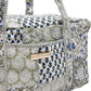 green and blue floral pattern duffle bag