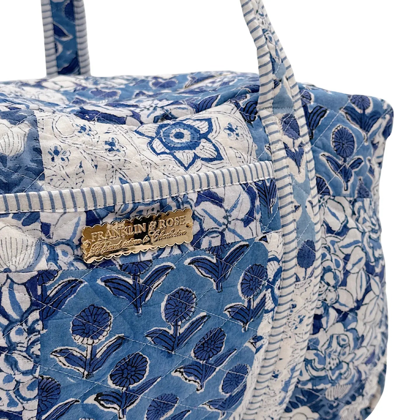 blue floral duffle bag