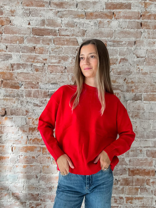 red crewneck sweater