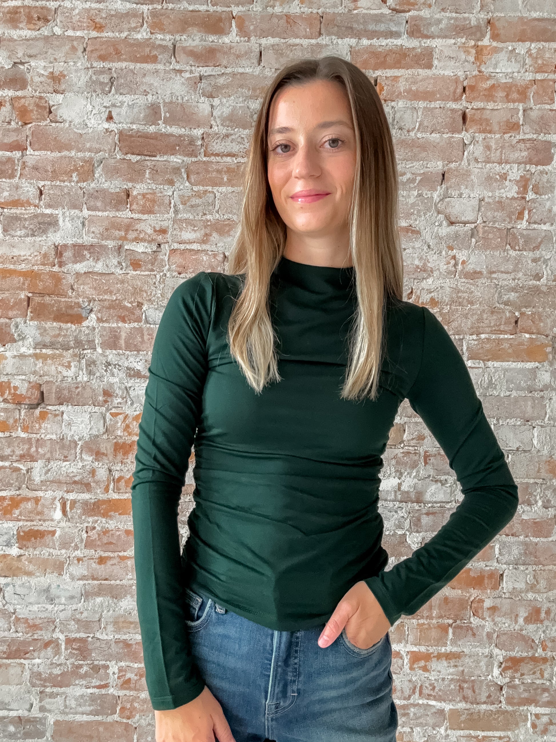 dark green fitted top