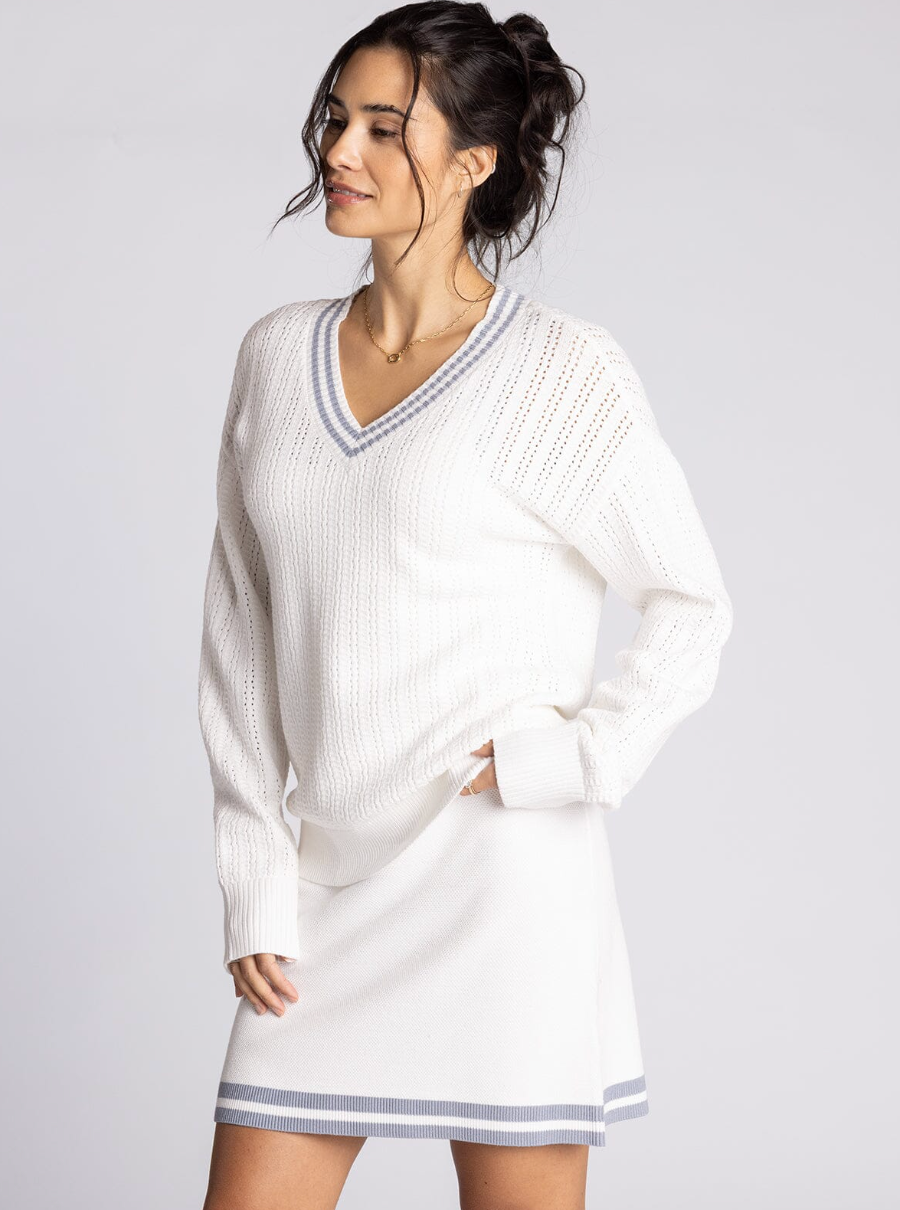 white v neck sweater with blue detailng