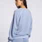 light blue crewneck athletic top