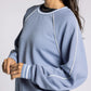light blue crewneck athletic top