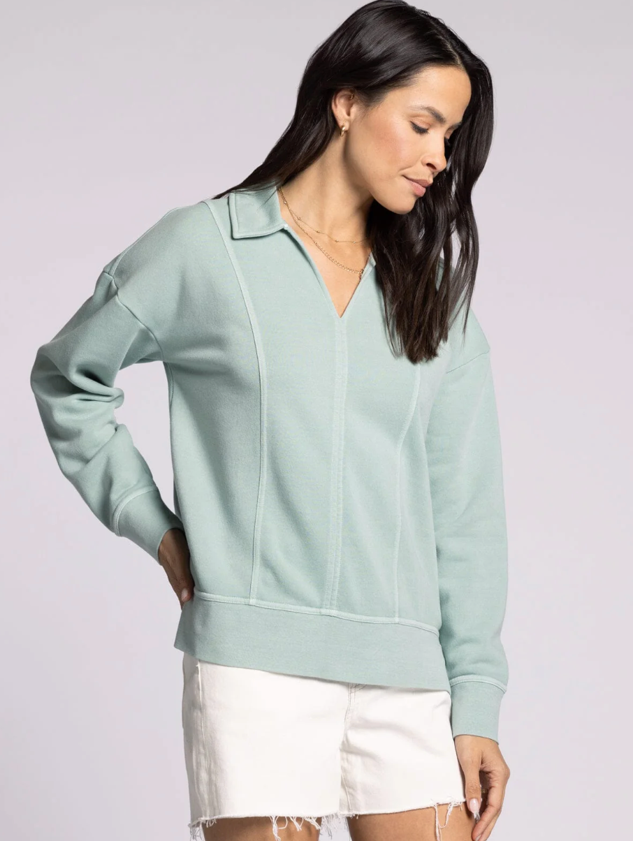light blue collared sweatshirt