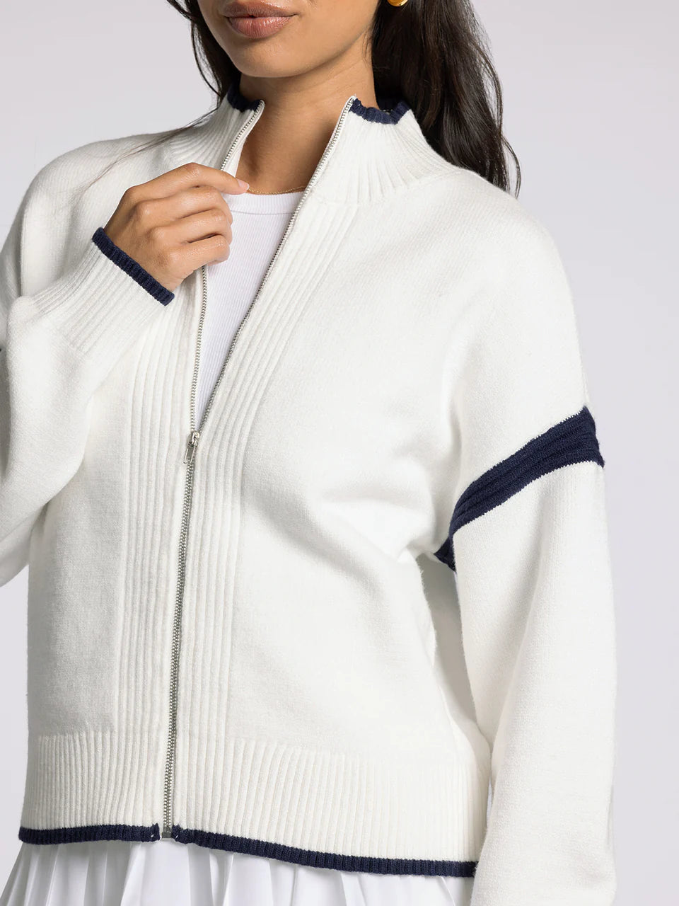 white sweater zip jacket with navy details