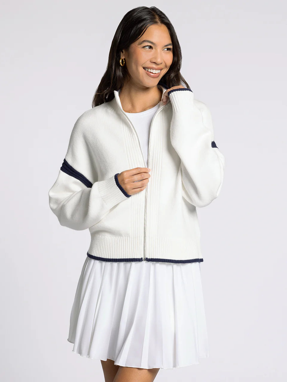 white sweater zip jacket with navy details