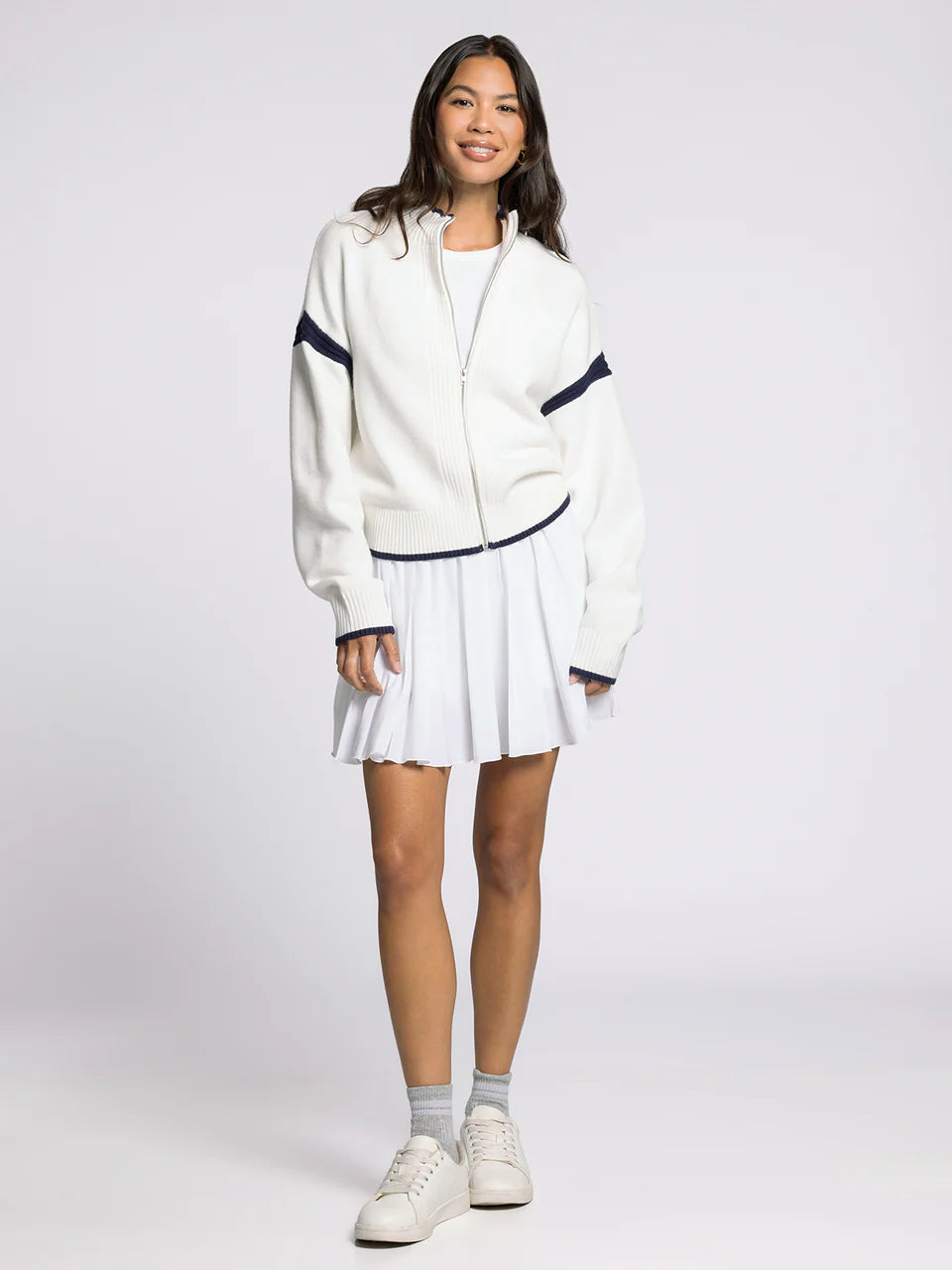white sweater zip jacket with navy details