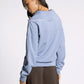 light blue 1/4 zip athletic top