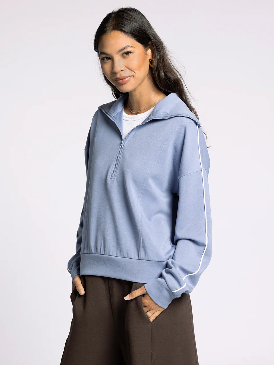 light blue 1/4 zip athletic top
