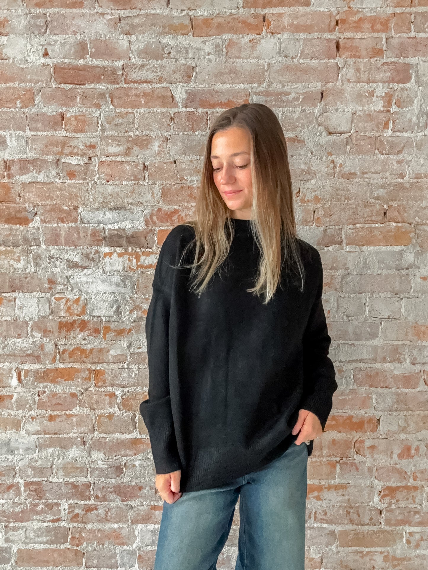 black mock neck tunic sweater