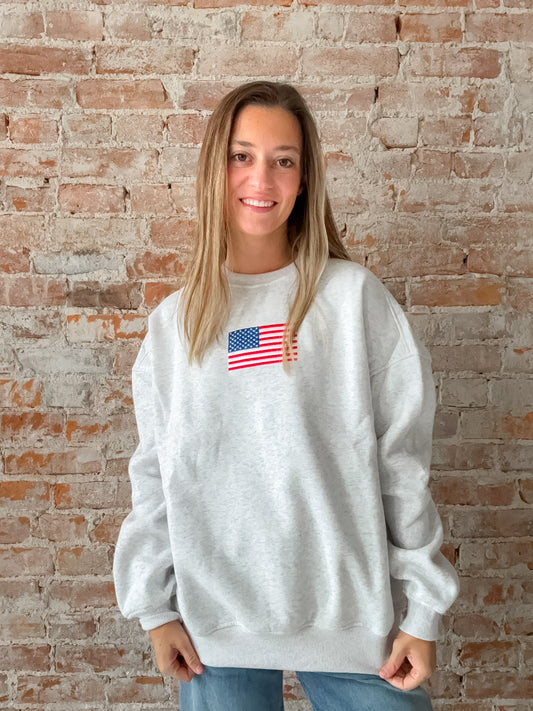 grey crewneck sweatshirt with embroidered american flag