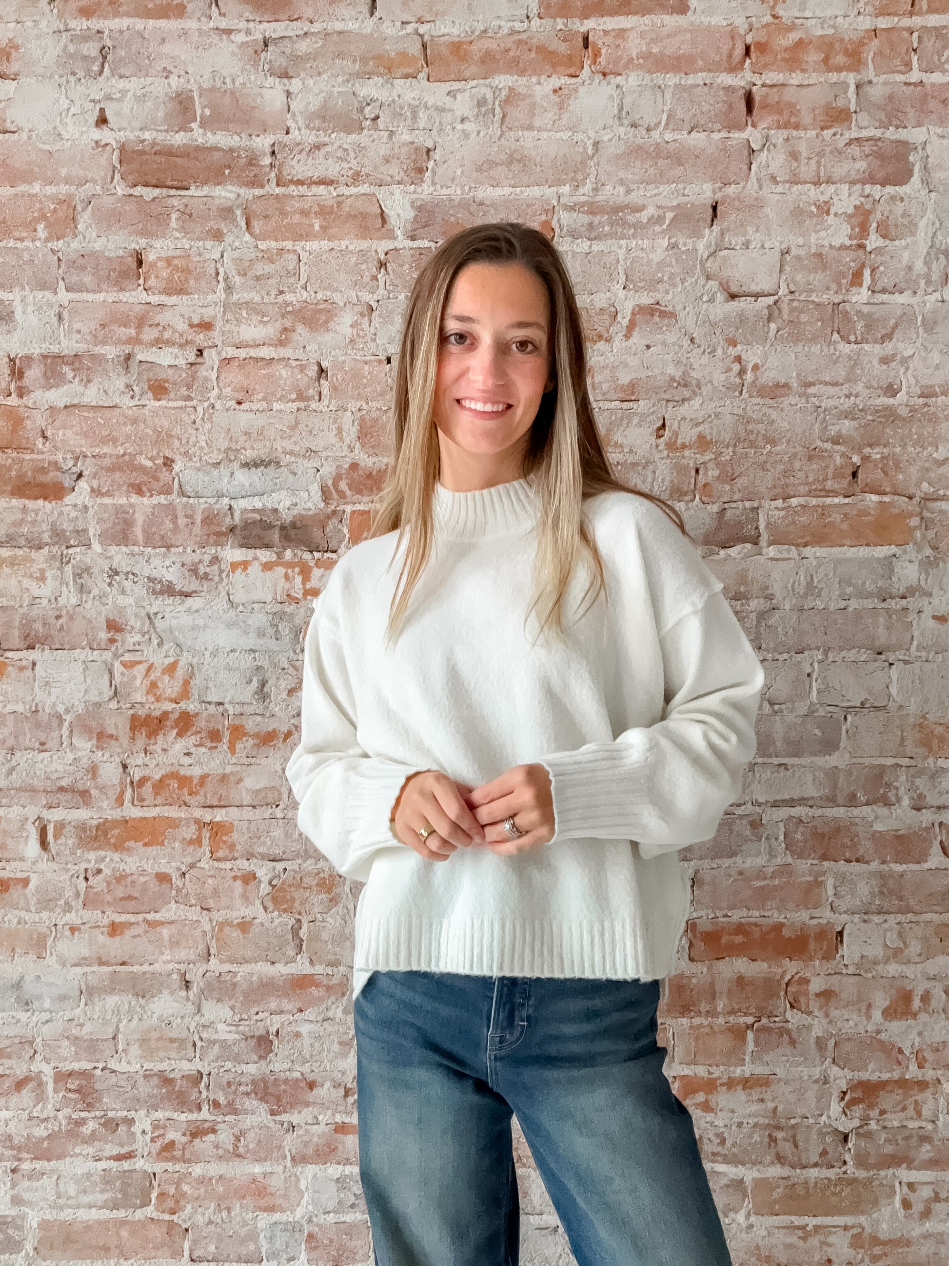 white turtle neck sweater