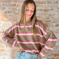 brown sweater with pink and white stripes